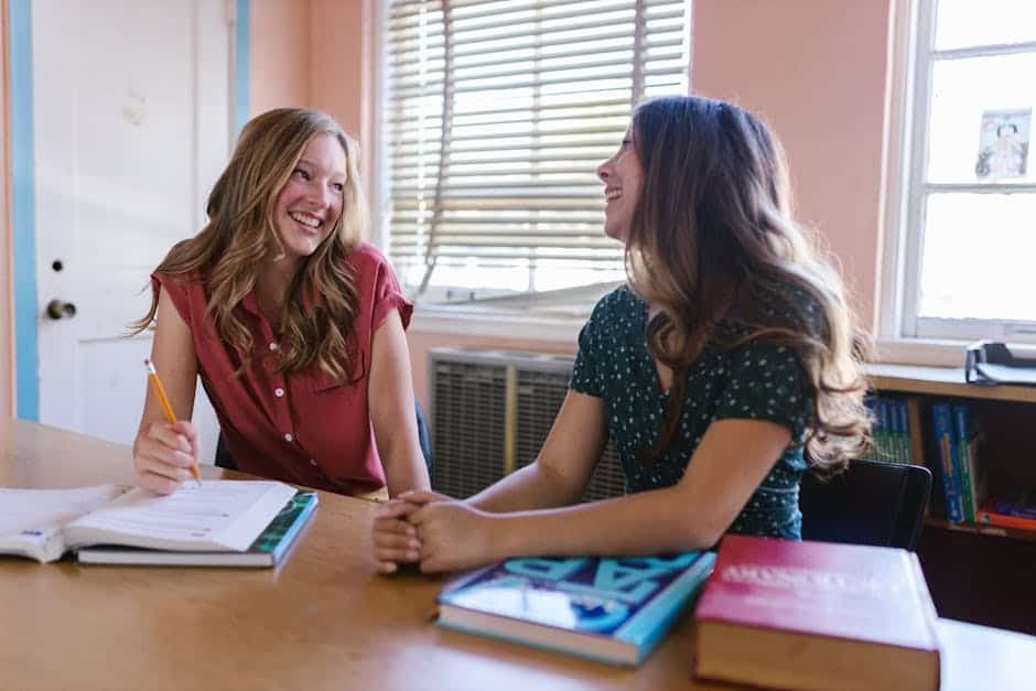 A teacher and student engaging in a conversation during a homeschool session.