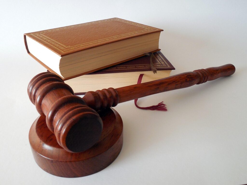Gavel and law books representing homeschool laws and legal requirements