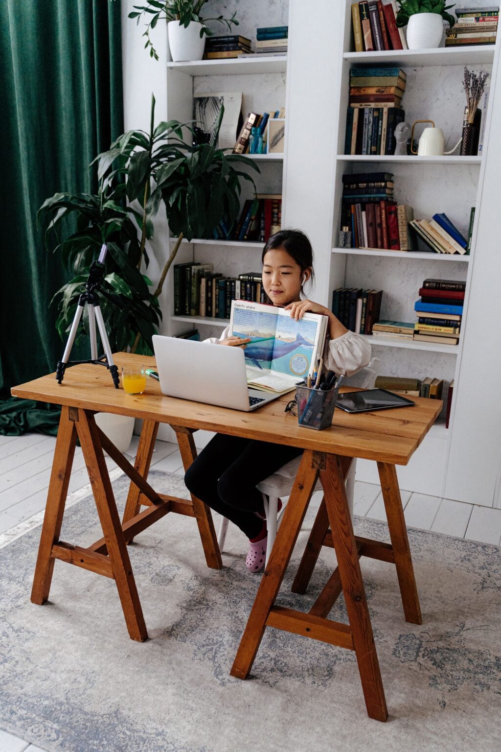 A student working through the week's plan at home